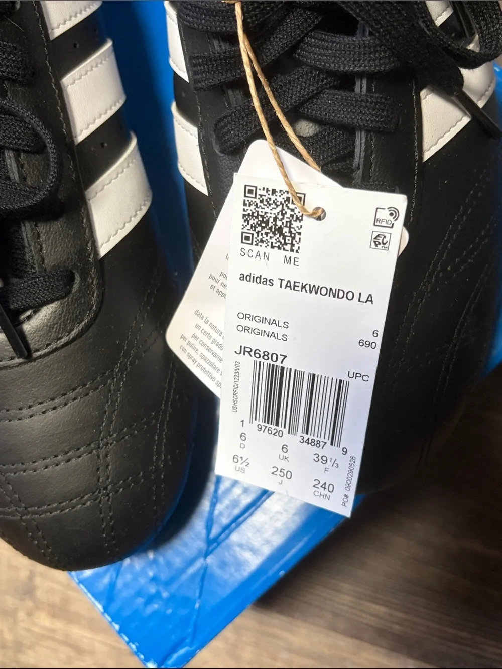 Adidas Black Sneakers with White Three Stripes